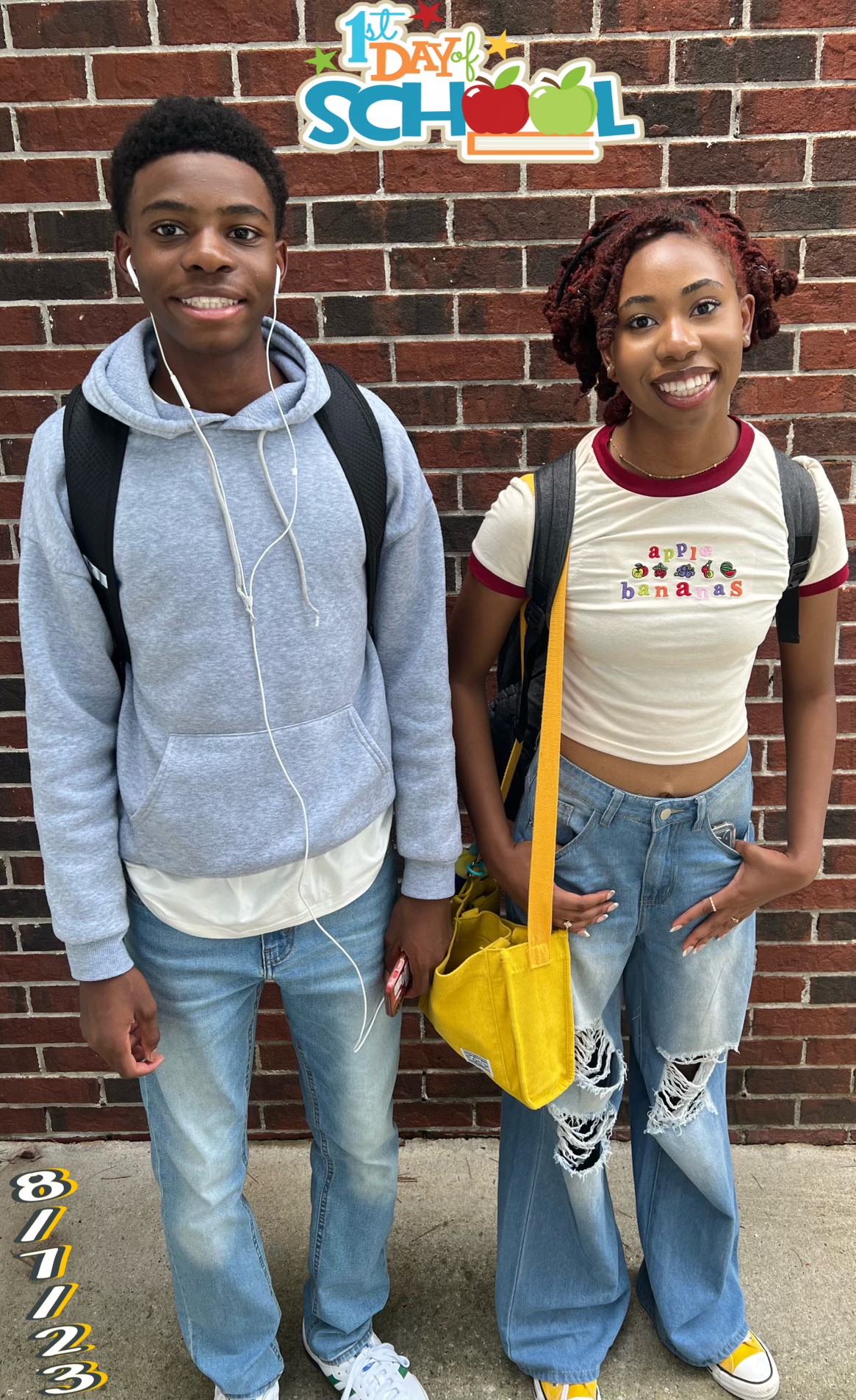 Two students smiling on their first day of school